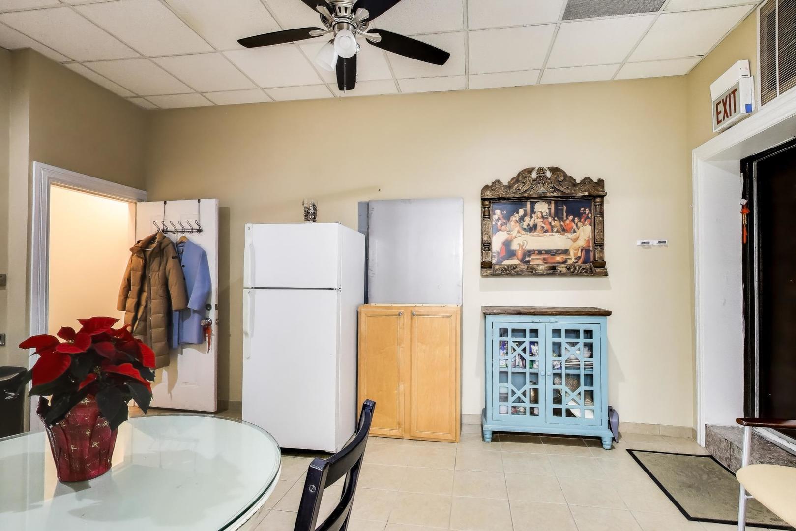 4346 North Pulaski Road, Unit C Chicago, IL 60641 - Photo 11 of 20 a living room with furniture and a large window