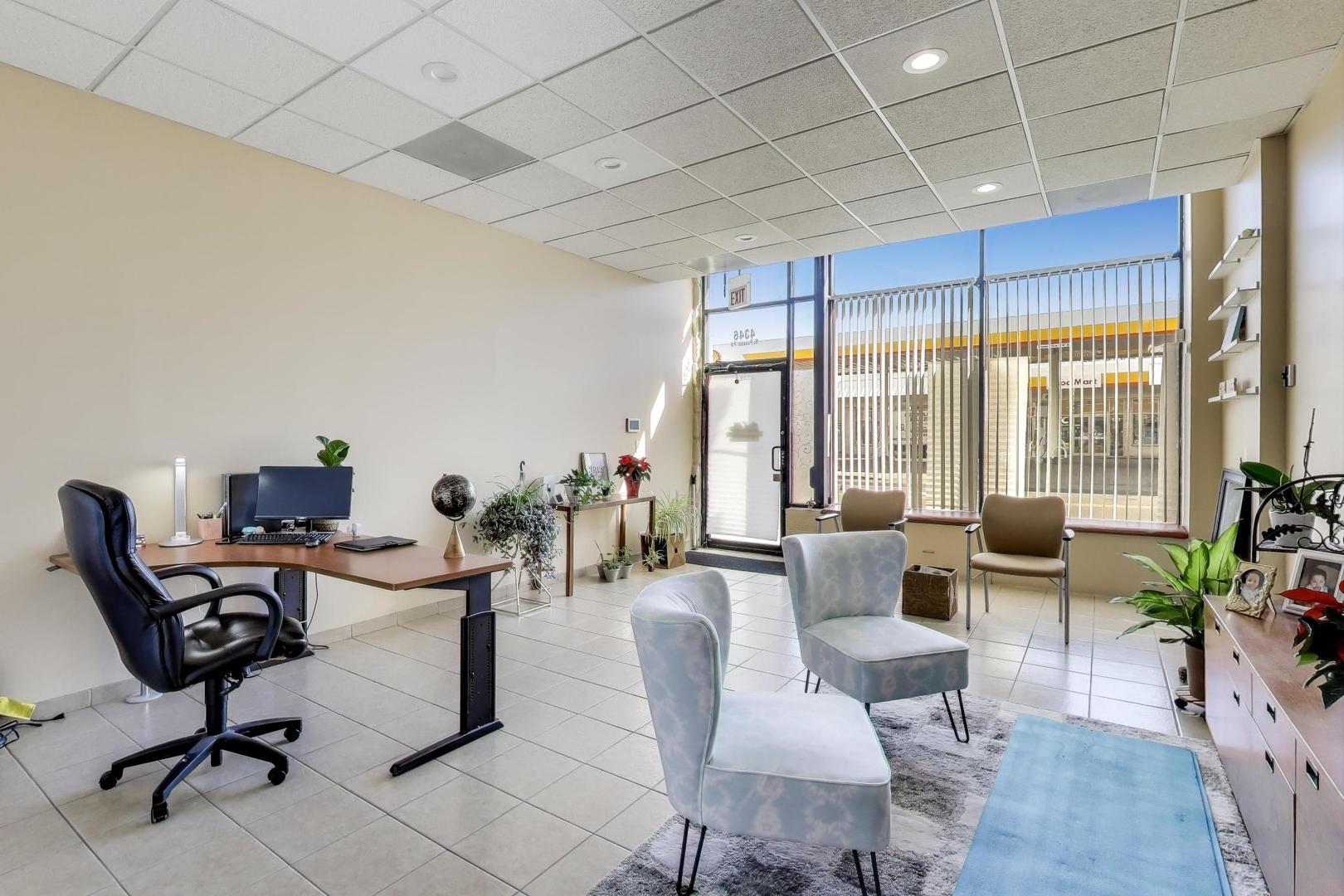 4346 North Pulaski Road, Unit C Chicago, IL 60641 - Photo 5 of 20 a workspace with furniture and a potted plant