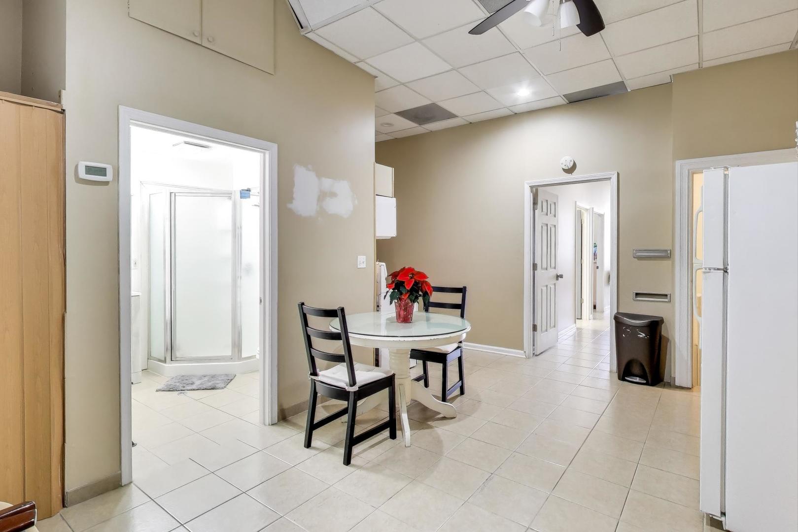 4346 North Pulaski Road, Unit C Chicago, IL 60641 - Photo 10 of 20 a workspace with furniture and a window