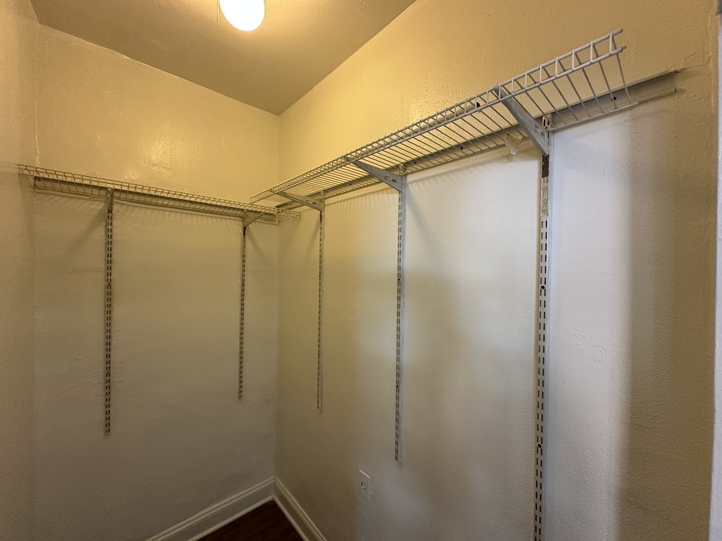 661 West Sheridan Road, Unit 208 Chicago, IL 60613 - Photo 15 of 20 a bathroom with a glass door shower