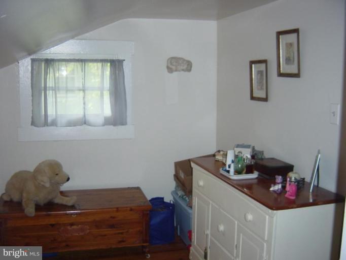 6508 Banbury Road Baltimore, MD 21239 - Photo 13 of 26 a room with a window
