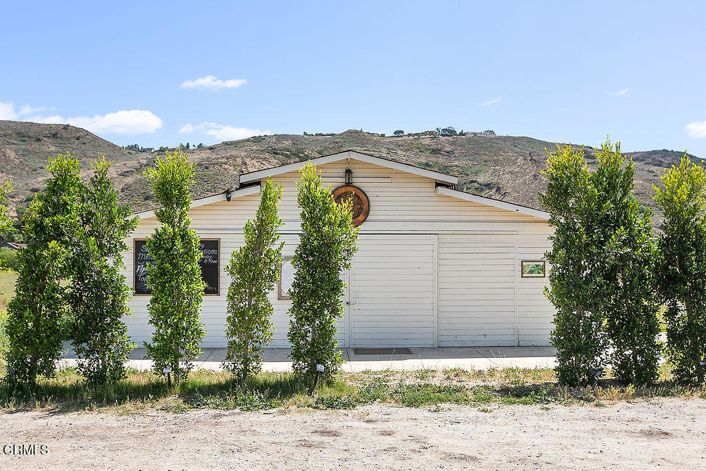 11664 Santa Rosa Road Camarillo, CA 93012 - Photo 2 of 21 a view of a house with a yard