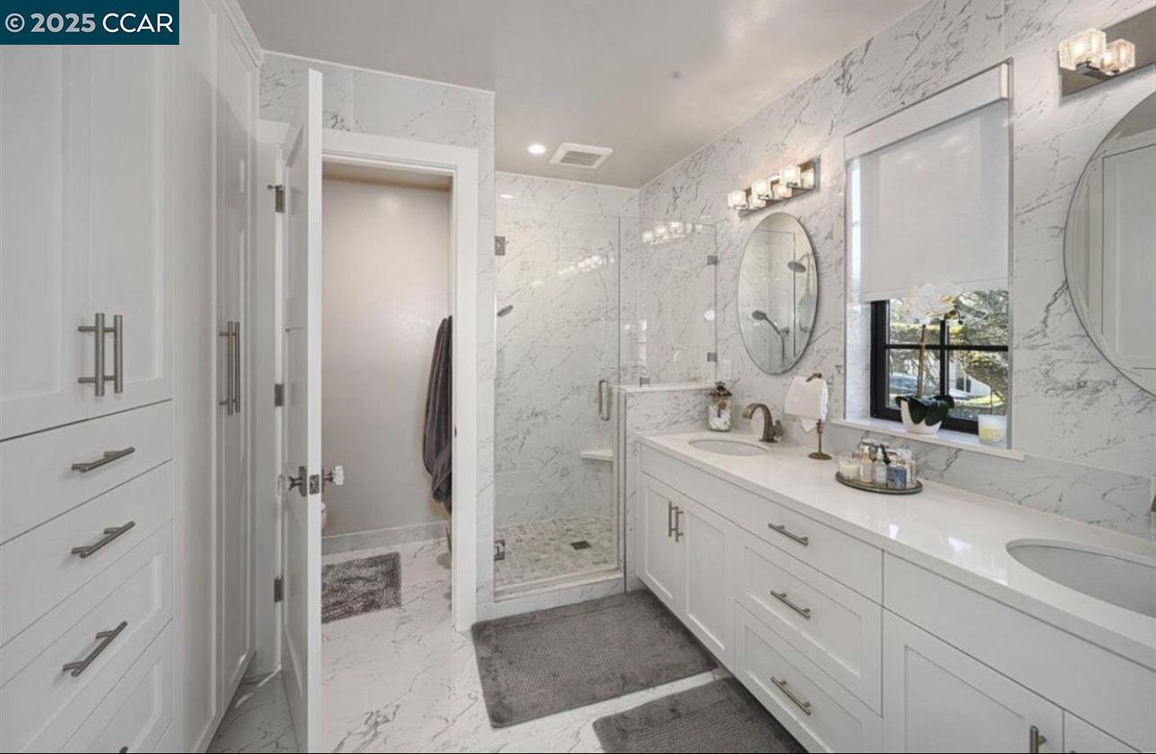 Stonegate Alamo, CA 94507 - Photo 4 of 8 a bathroom with a double vanity sink mirror double and shower