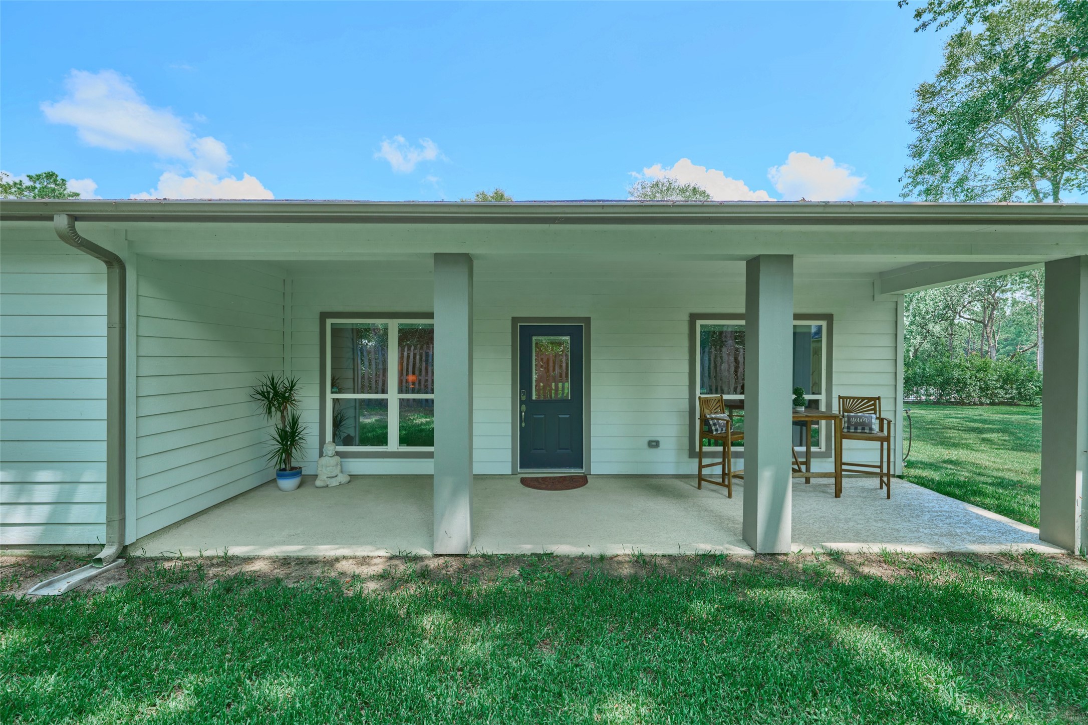 2218 Honea Egypt Road Magnolia, TX 77354 - Photo 11 of 50 Inviting covered patio with a private entrance to a versatile in-law suite.