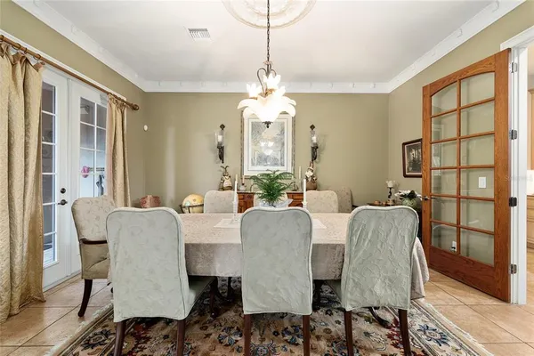 a bathroom with a double vanity sink a mirror a and a shower