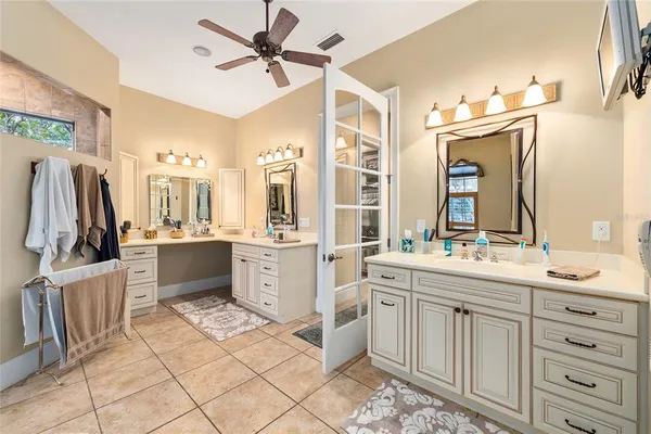 a large kitchen with kitchen island a sink counter space and living room view