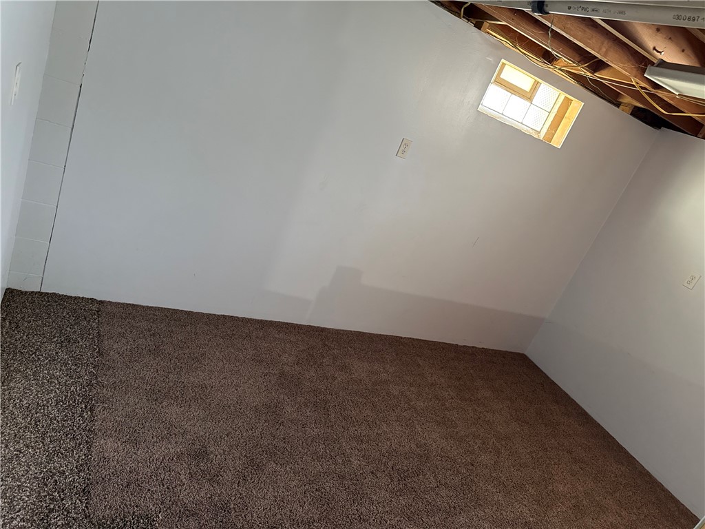 4732 Lehigh Drive Springfield, OH 45503 - Photo 20 of 27 This spacious basement room features durable carpeting and a window for natural light.