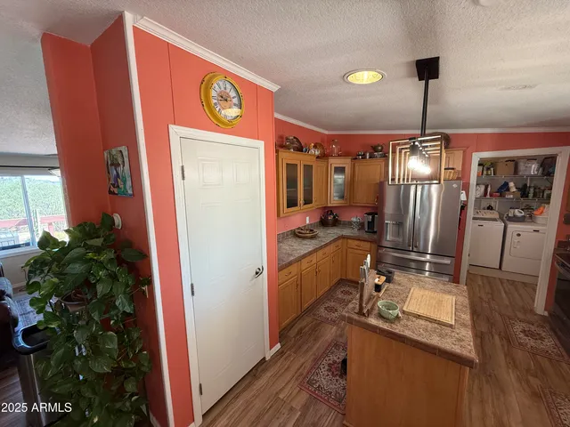 a kitchen with a stove and a microwave