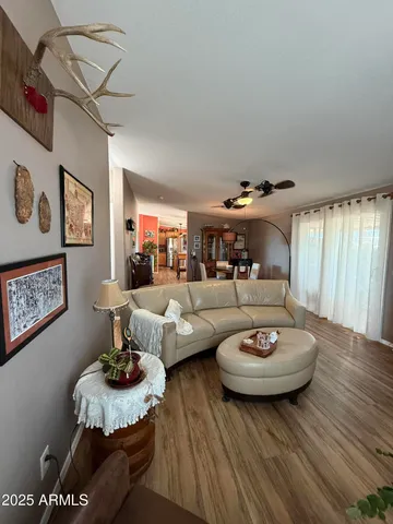 a bedroom with furniture and a window