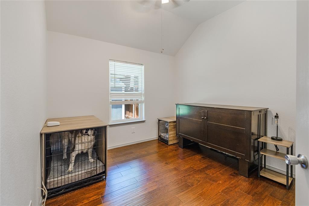 2813 Ridgemere Drive Flower Mound, TX 75028 - Photo 10 of 18 a bedroom with furniture and a window