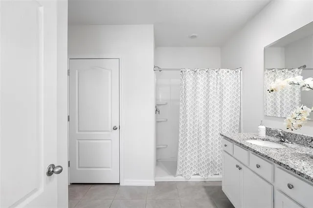 a room with furniture and flat screen tv