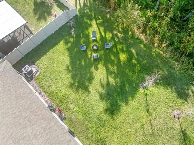 a view of a yard with plants