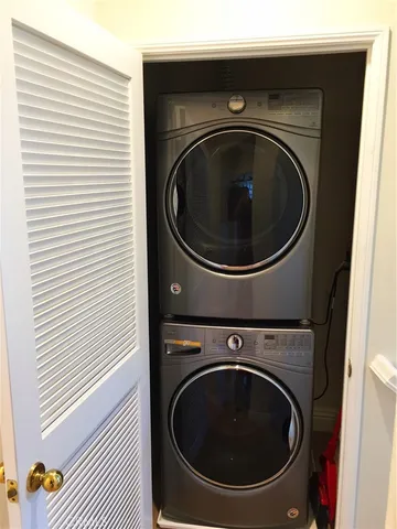 a bathroom with a sink and a washer