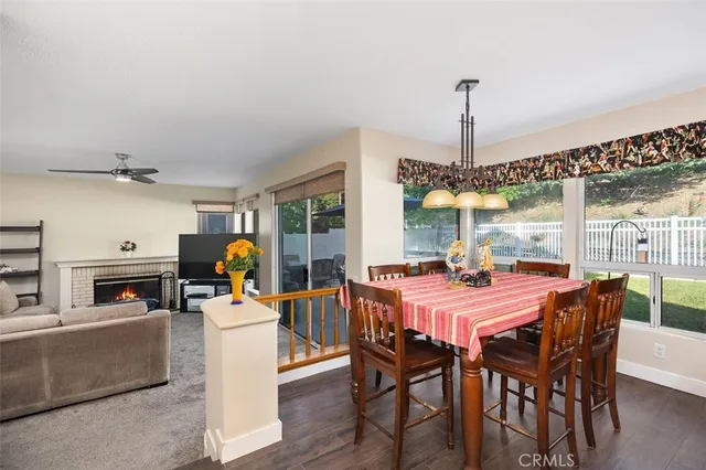 a kitchen with stainless steel appliances granite countertop sink stove and refrigerator