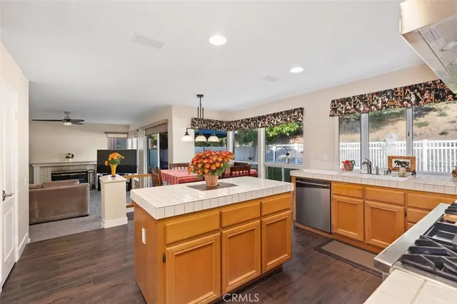 a kitchen that has a table and chairs in it