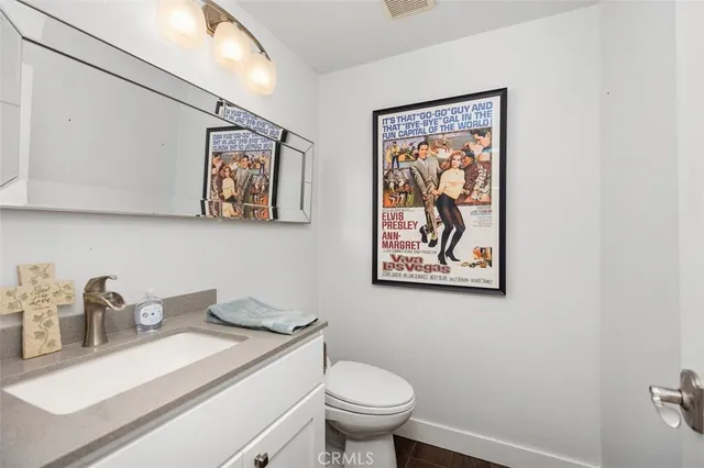 a view of bathroom with dual sinks