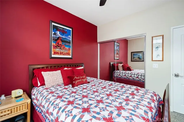 a bathroom with a sink vanity mirror and toilet