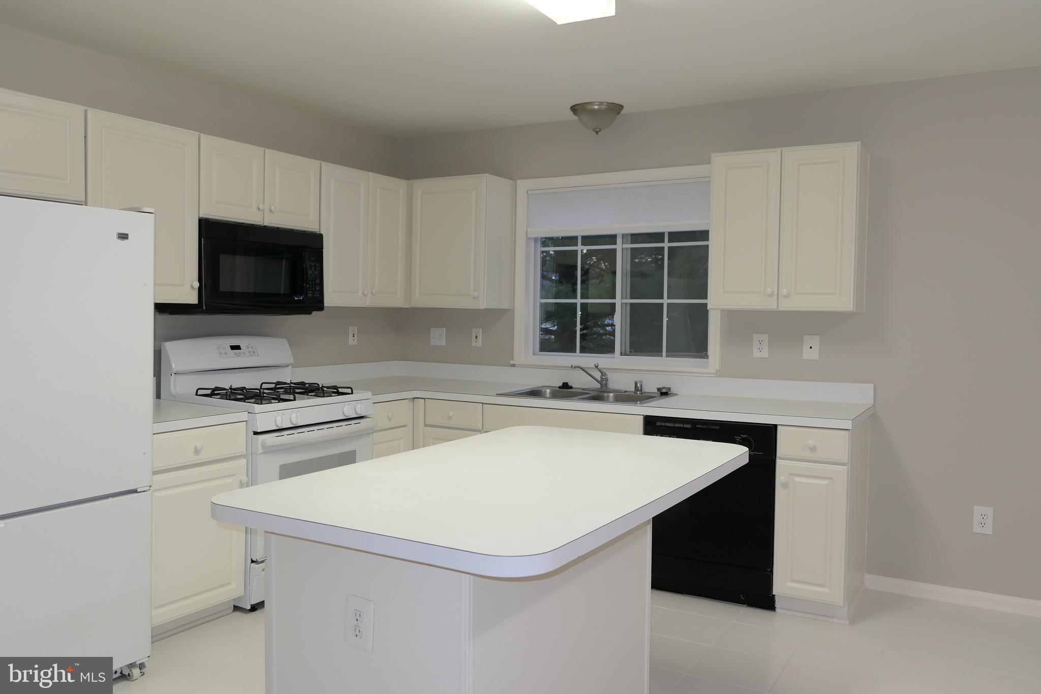 5 Rumsford Court Reisterstown, MD 21136 - Photo 14 of 38 Kitchen w/Gas Range & Built-in Microwave