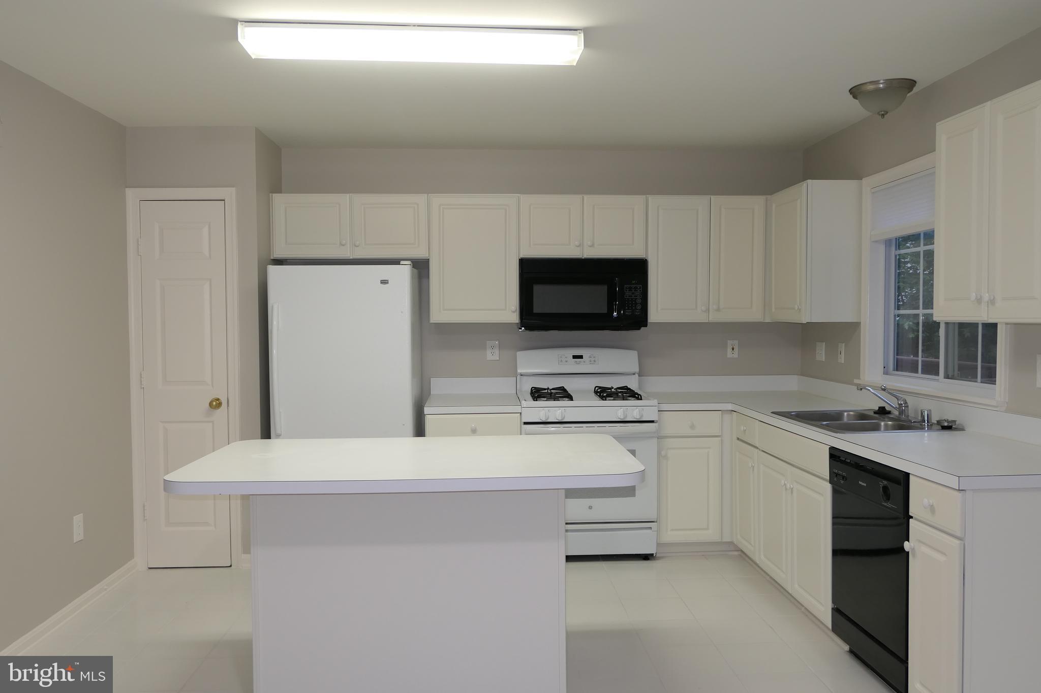 5 Rumsford Court Reisterstown, MD 21136 - Photo 6 of 38 Kitchen w/Pantry & Breakfast Island w/Chair Space