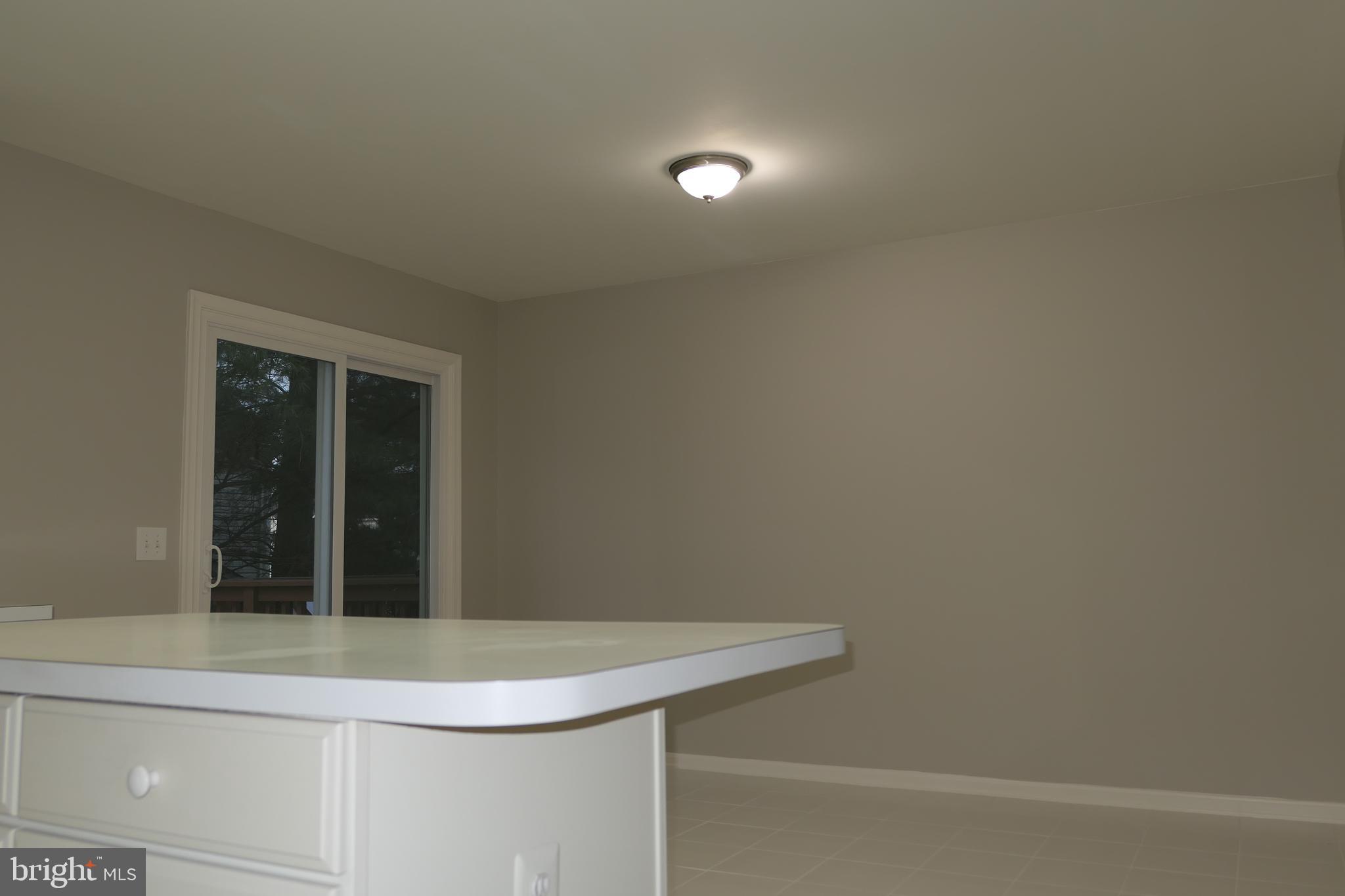 5 Rumsford Court Reisterstown, MD 21136 - Photo 7 of 38 Kitchen w/Slider to Deck & Table Space plus more