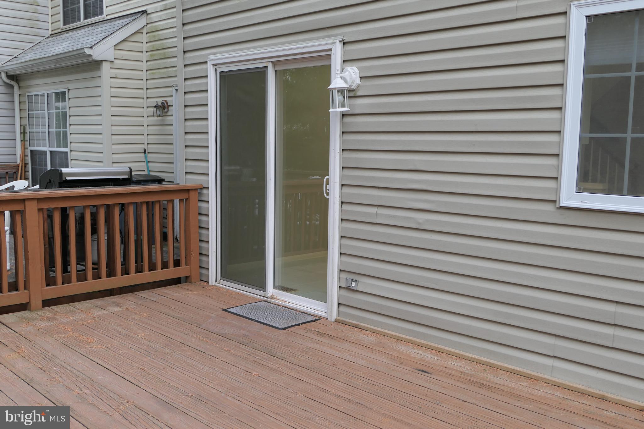 5 Rumsford Court Reisterstown, MD 21136 - Photo 8 of 38 Sliders from Kitchen to Deck