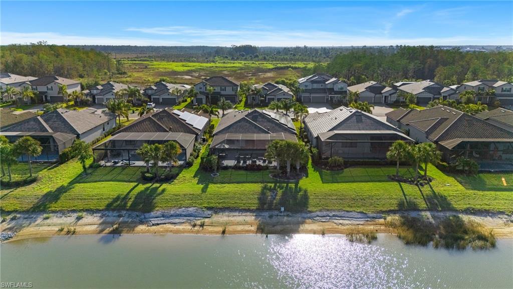 19656 The Pl Boulevard Estero, FL 33928 - Photo 29 of 42 an aerial view of residential houses with outdoor space and ocean view