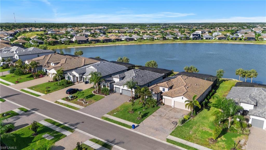 19656 The Pl Boulevard Estero, FL 33928 - Photo 35 of 42 an aerial view of a house with a lake view