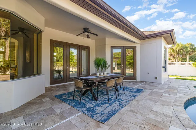a view of a house with patio outdoor seating