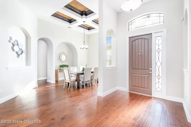 a view of a livingroom with furniture and wooden floor