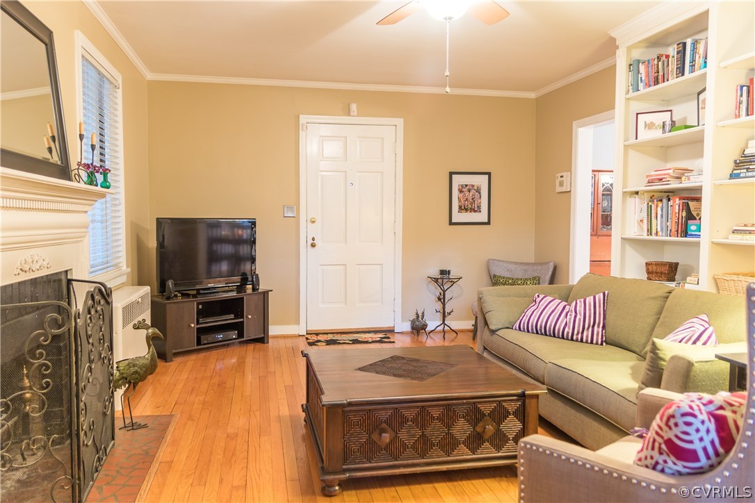 5109 Sylvan Road Richmond, VA 23225 - Photo 4 of 27 Living room with hardwood floor, built ins, wood b