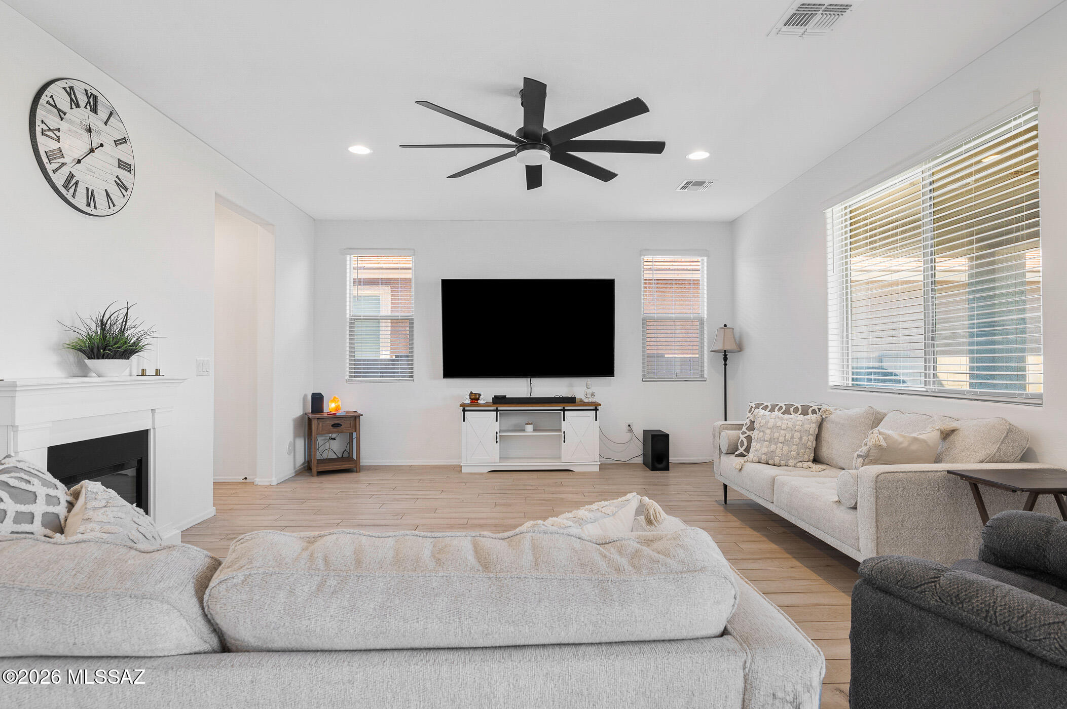 12092 East Ryscott Circle Vail, AZ 85641 - Photo 10 of 49 a living room with furniture and a flat screen tv
