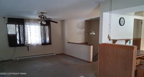 a kitchen with a sink a stove and a refrigerator