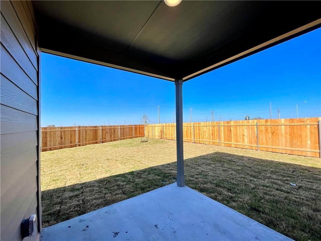 126 Canley Loop Hutto, TX 78634 - Photo 2 of 24 a view of an empty room and window