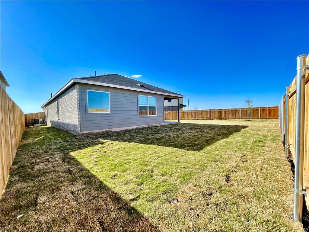 126 Canley Loop Hutto, TX 78634 - Photo 24 of 24 a view of backyard of house with green space