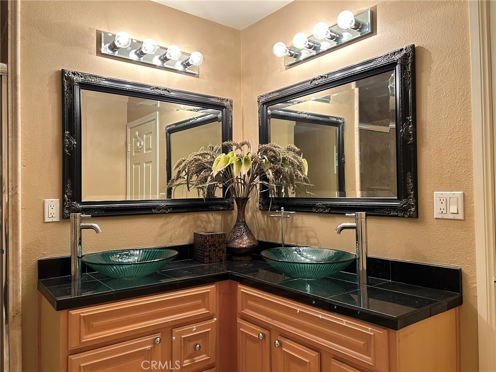 300 South Timken Road Anaheim, CA 92808 - Photo 31 of 40 a bathroom with a sink and a mirror