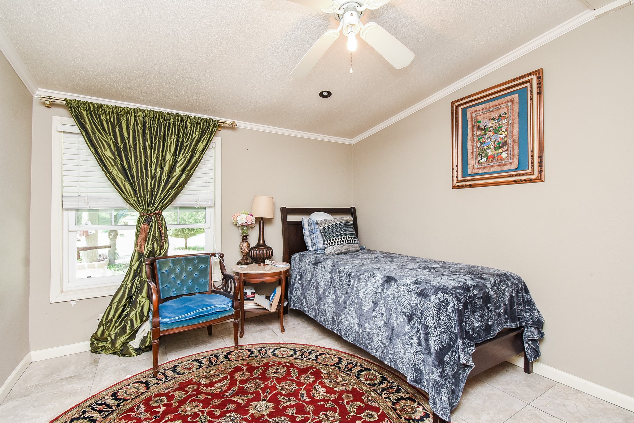 39551 Donigan Road Brookshire, TX 77423 - Photo 26 of 37 Bedroom featuring ceiling fan, crown molding, light tile patterned floors, and lofted ceiling