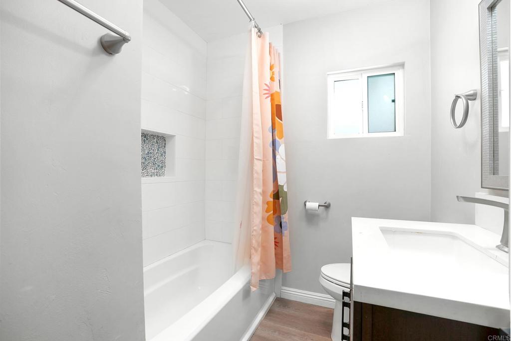 3581 Trophy Drive La Mesa, CA 91941 - Photo 11 of 22 a bathroom with a bathtub and shower