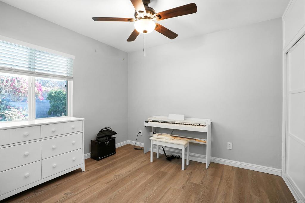 3581 Trophy Drive La Mesa, CA 91941 - Photo 13 of 22 a room with a desk and a window