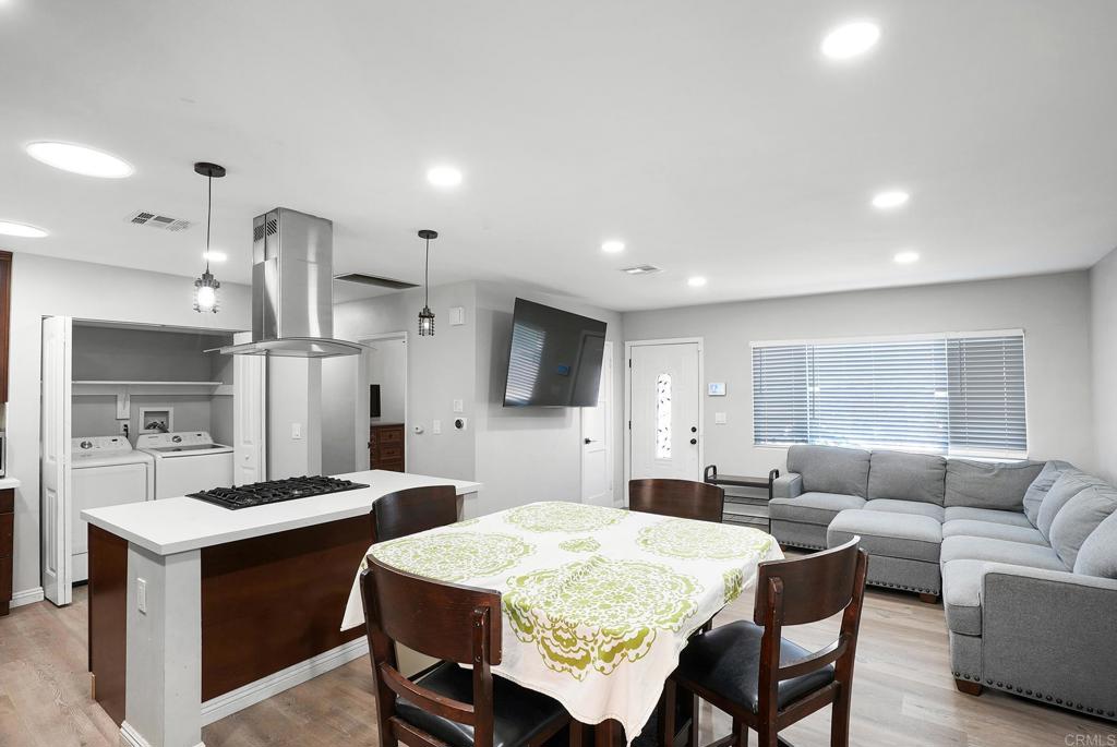 3581 Trophy Drive La Mesa, CA 91941 - Photo 6 of 22 a large kitchen with a table and chairs