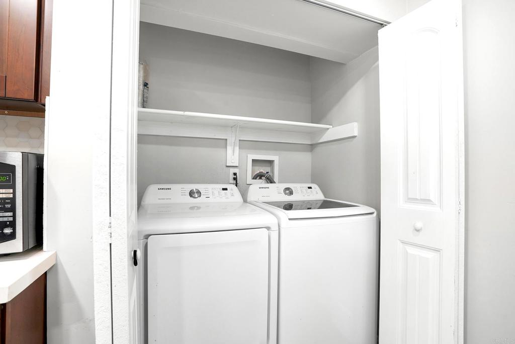 3581 Trophy Drive La Mesa, CA 91941 - Photo 7 of 22 a utility room with dryer and washer
