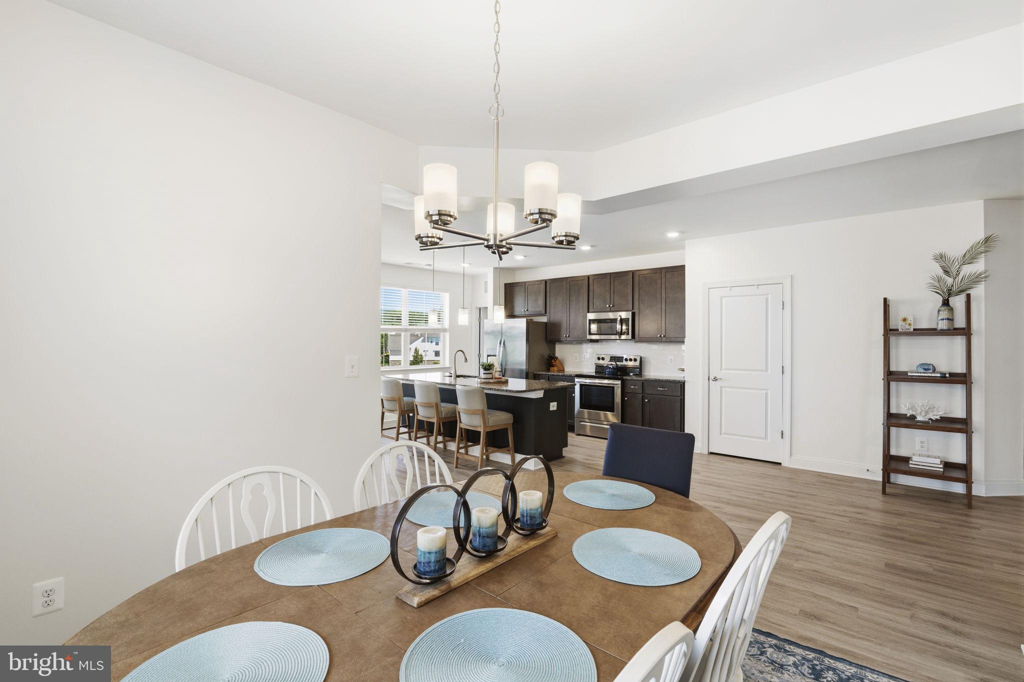 401 Bold Ruler Court, Unit 307 Havre de Grace, MD 21078 - Photo 17 of 32 Dining room w/ chandelier