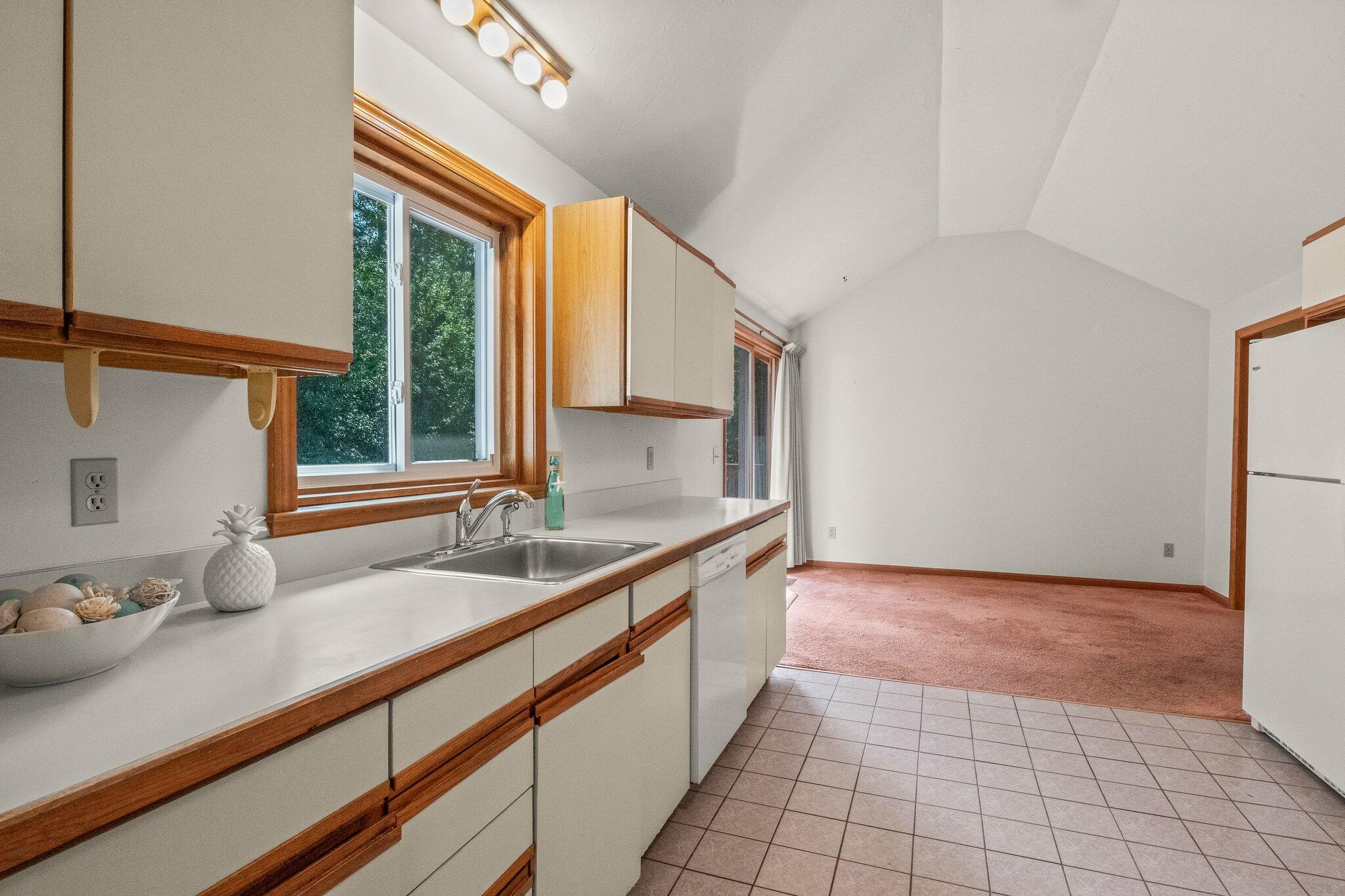 64 Eisenhower Drive Cotuit, MA 02635 - Photo 17 of 67 Kitchen to dining room