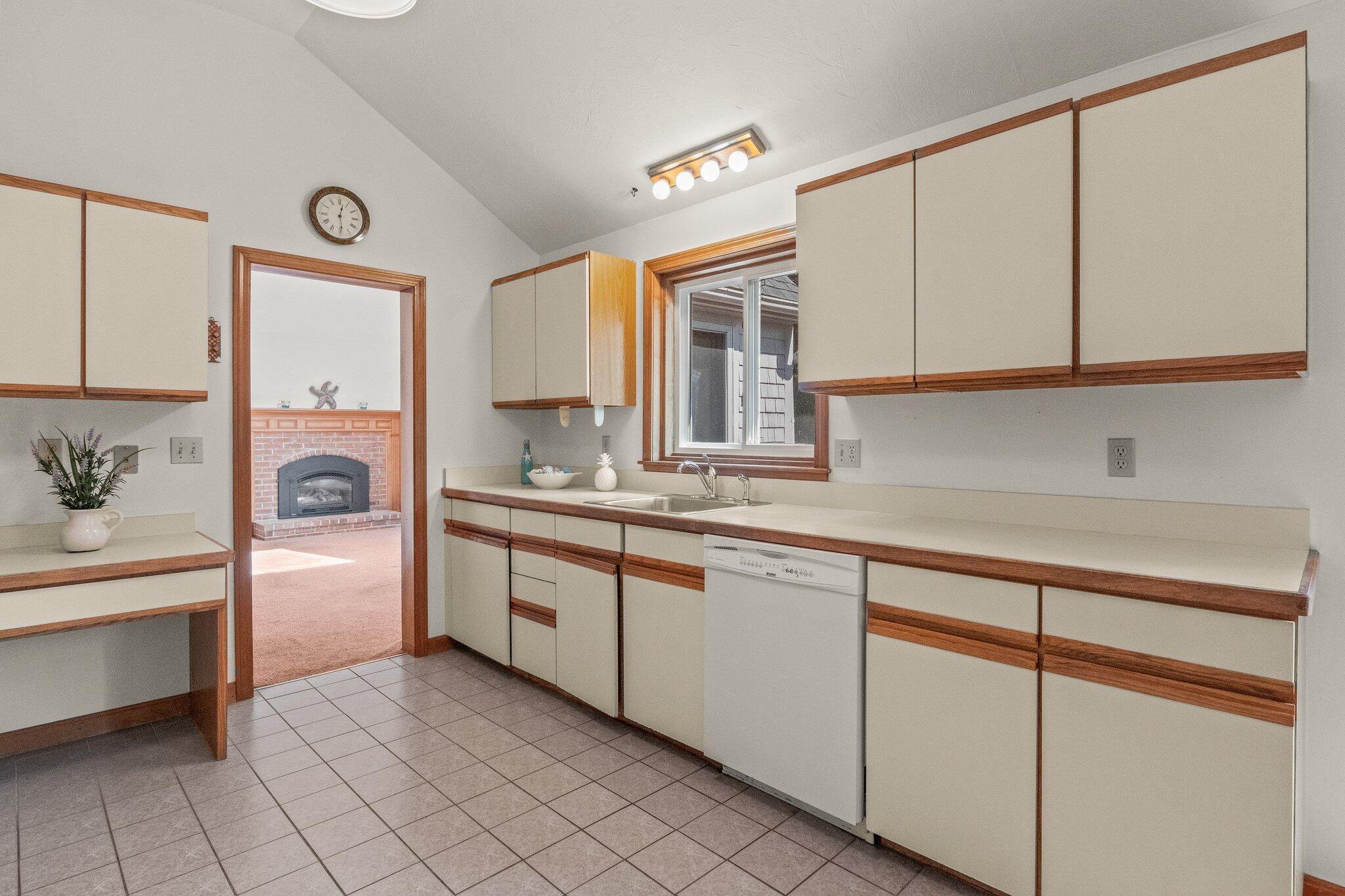 64 Eisenhower Drive Cotuit, MA 02635 - Photo 20 of 67 Kitchen with peek into family room