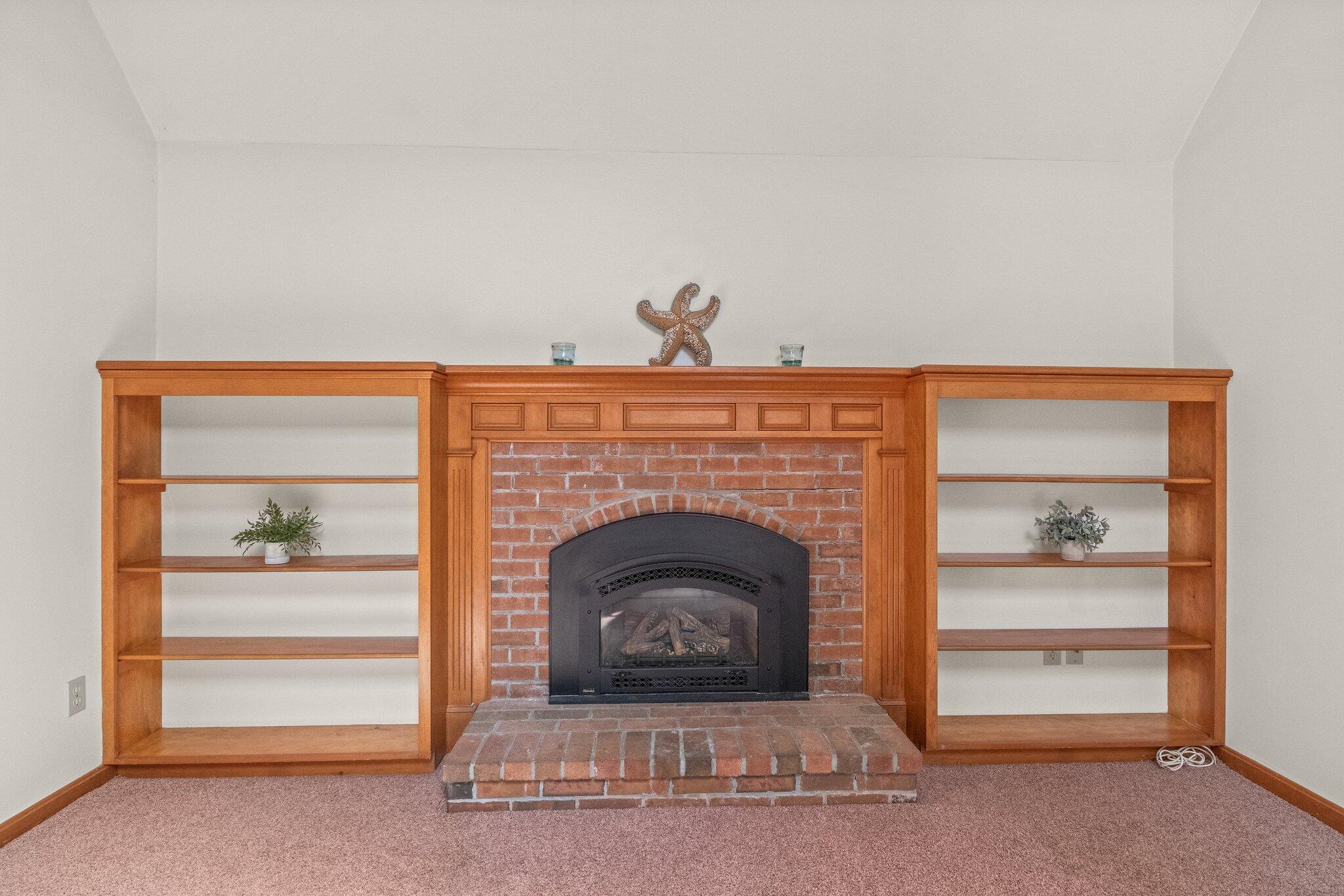 64 Eisenhower Drive Cotuit, MA 02635 - Photo 24 of 67 Family room gas fireplace & built-ins