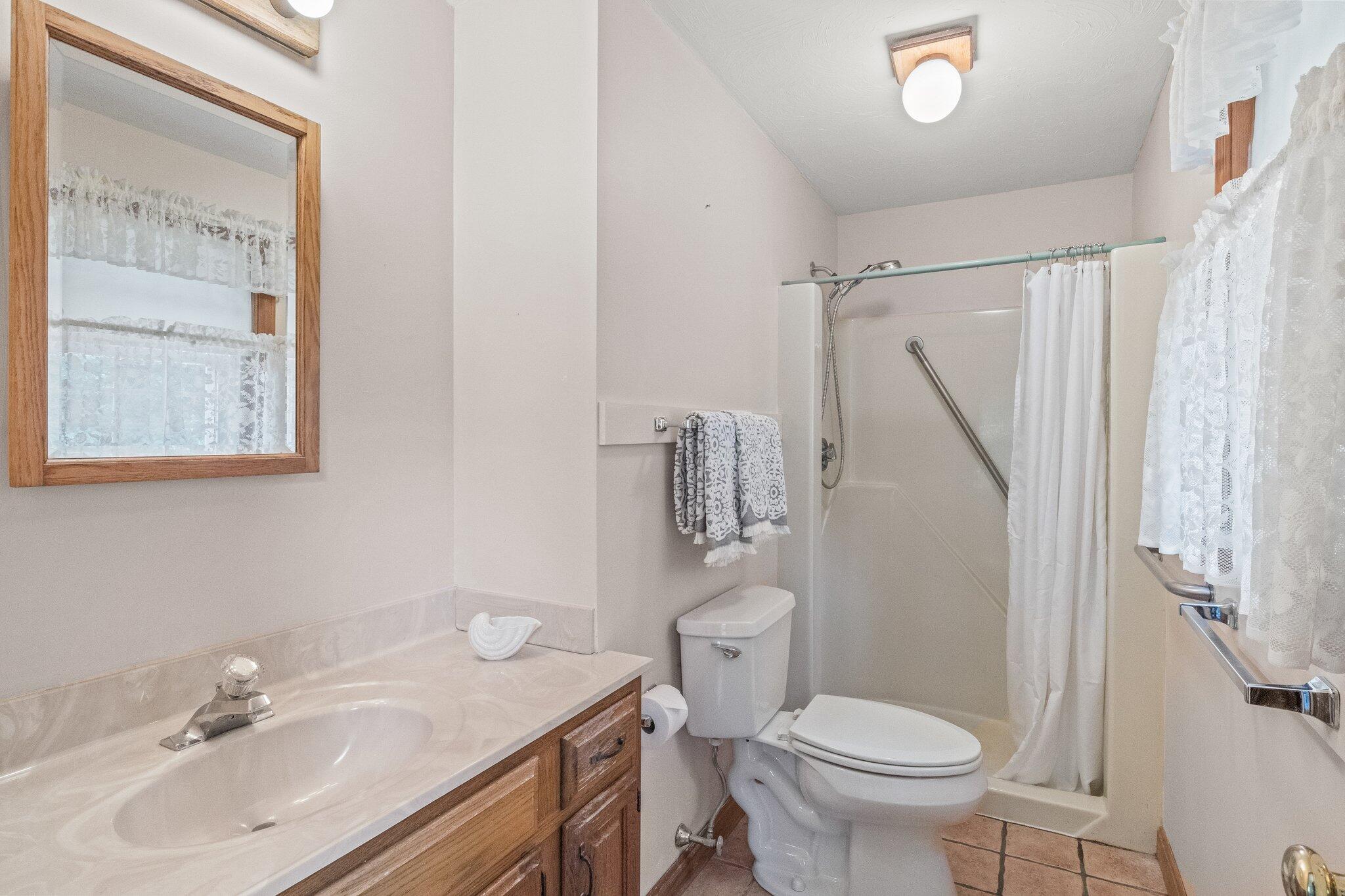 64 Eisenhower Drive Cotuit, MA 02635 - Photo 31 of 67 Primary bedroom bath with shower