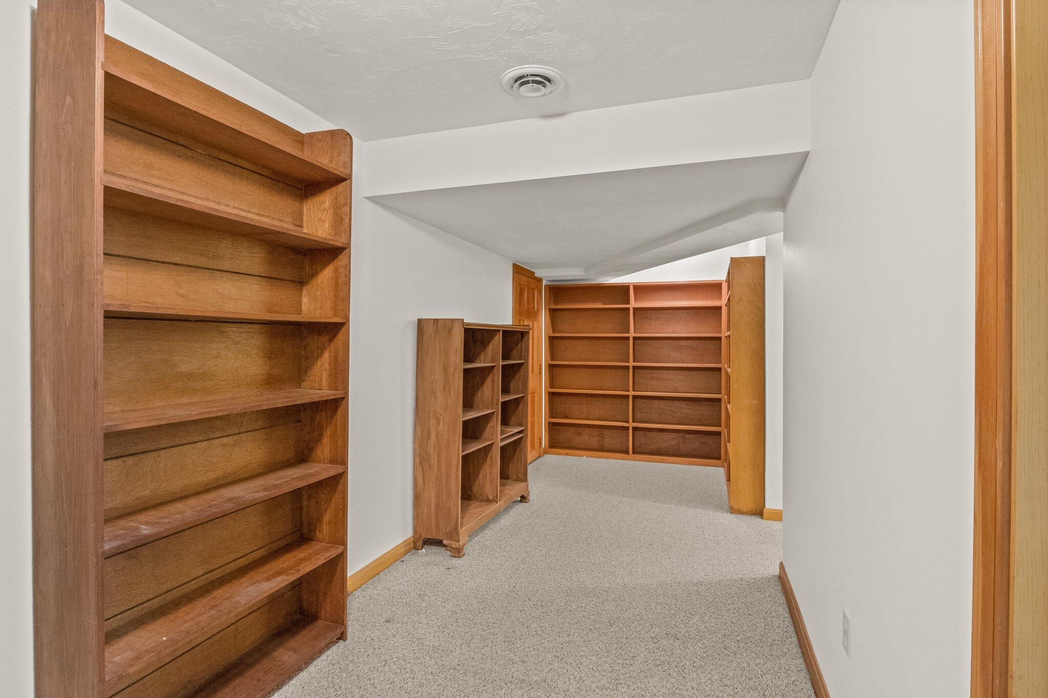 64 Eisenhower Drive Cotuit, MA 02635 - Photo 39 of 67 Library