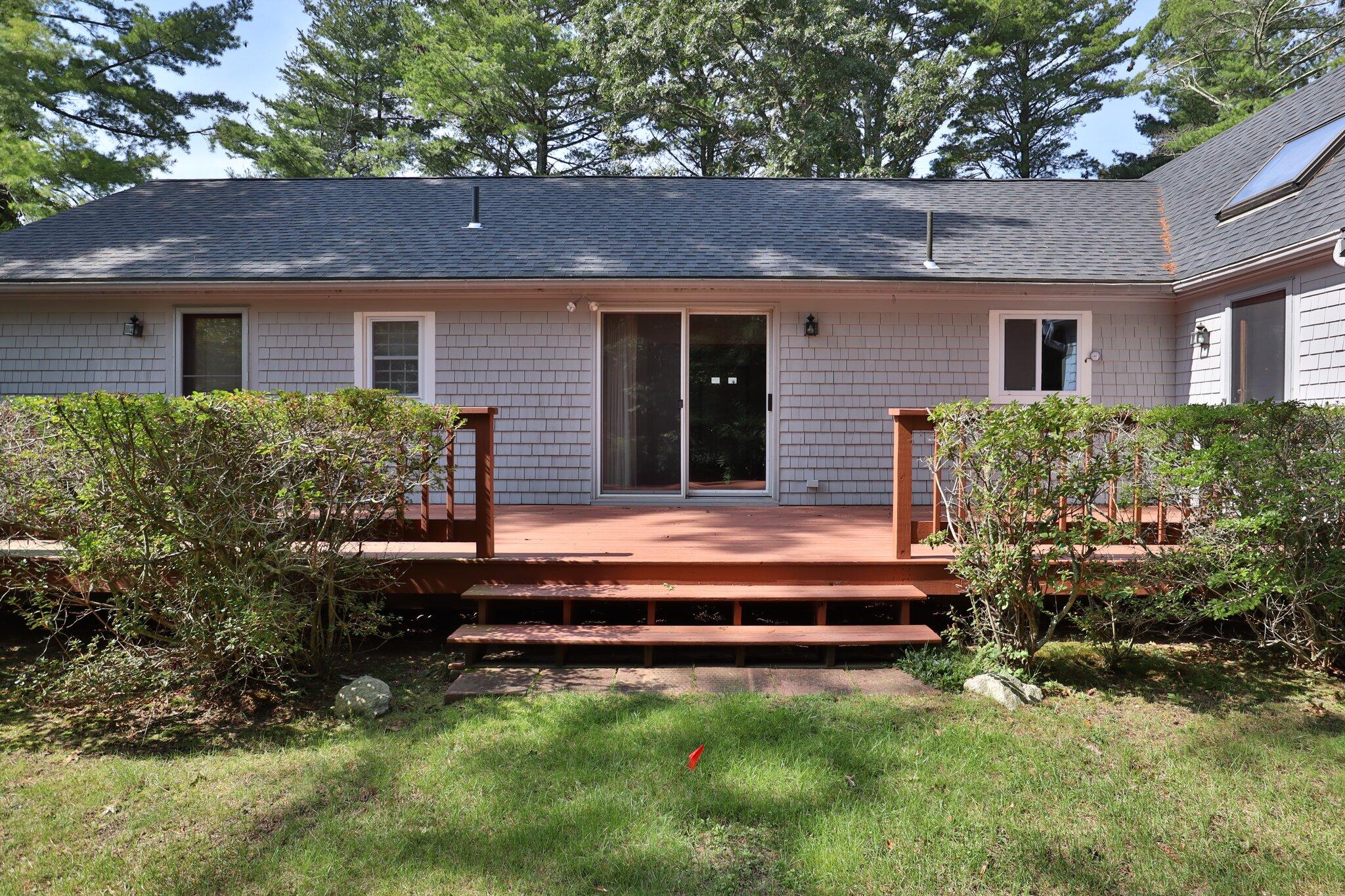 64 Eisenhower Drive Cotuit, MA 02635 - Photo 5 of 67 Expansive deck