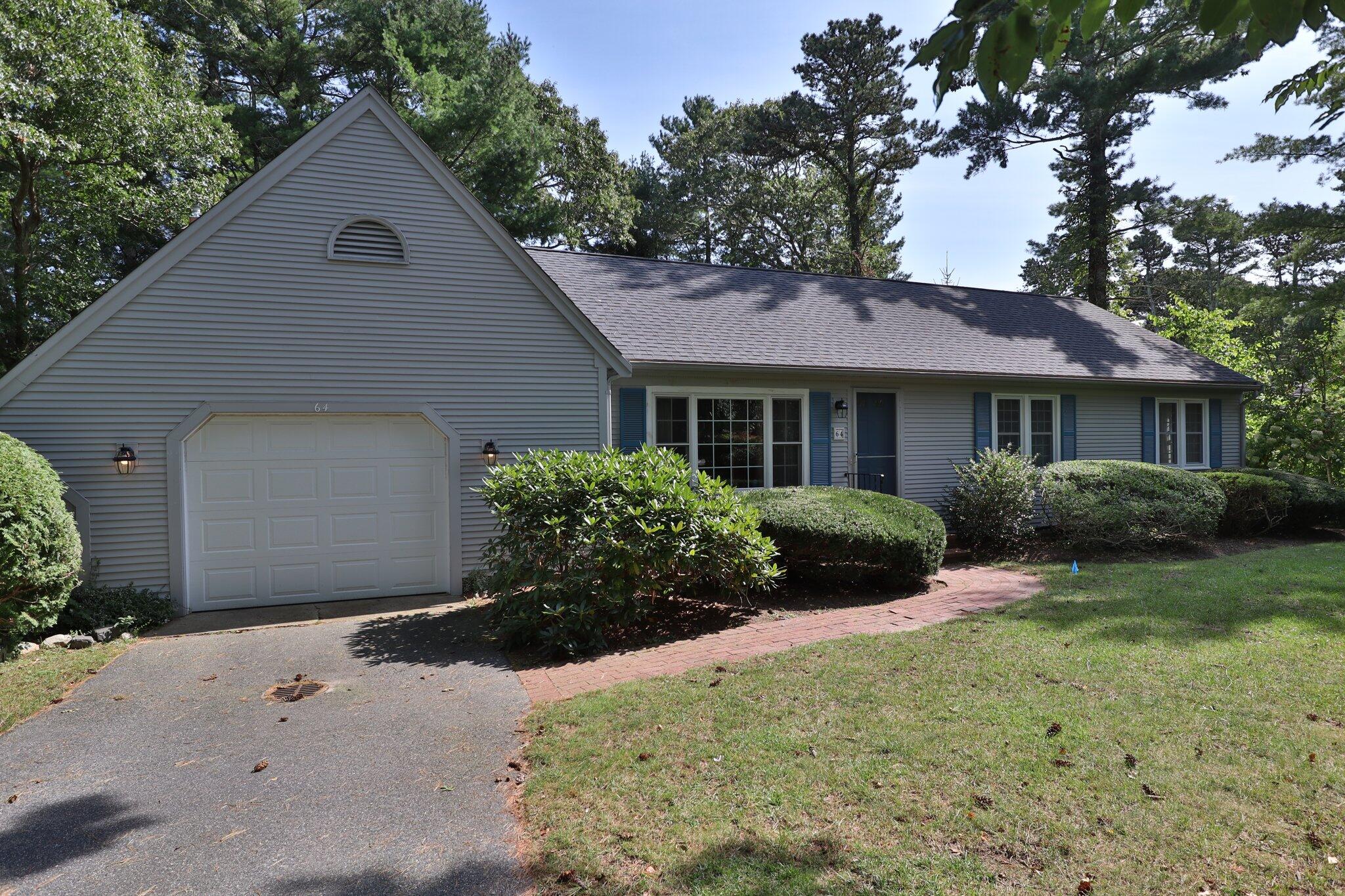 64 Eisenhower Drive Cotuit, MA 02635 - Photo 6 of 67 Front from driveway