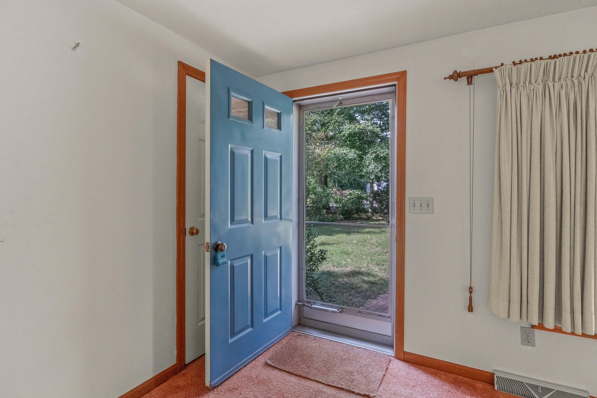 64 Eisenhower Drive Cotuit, MA 02635 - Photo 8 of 67 Front entrance to living room