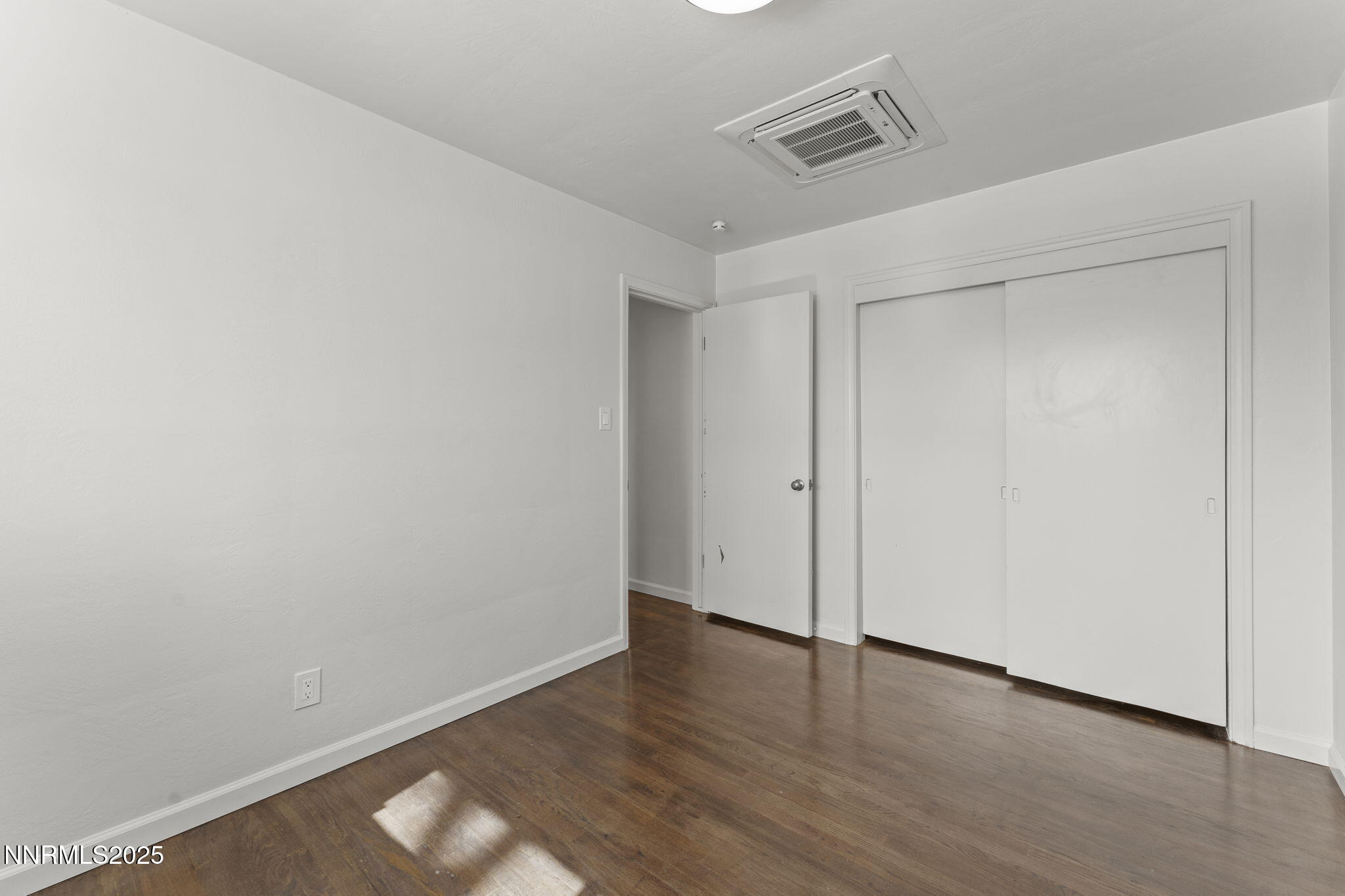 840 Brookfield Drive Reno, NV 89503 - Photo 24 of 42 a view of an empty room with wooden floor